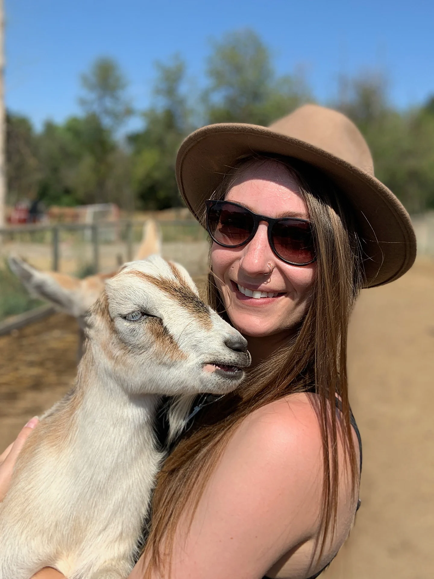 Amanda Holding Goat - Branchability - Adapted Recreation Programs