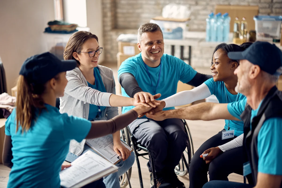 Man in wheelchair volunteering for community organizations - Branchability - Inclusive Workshops and Training