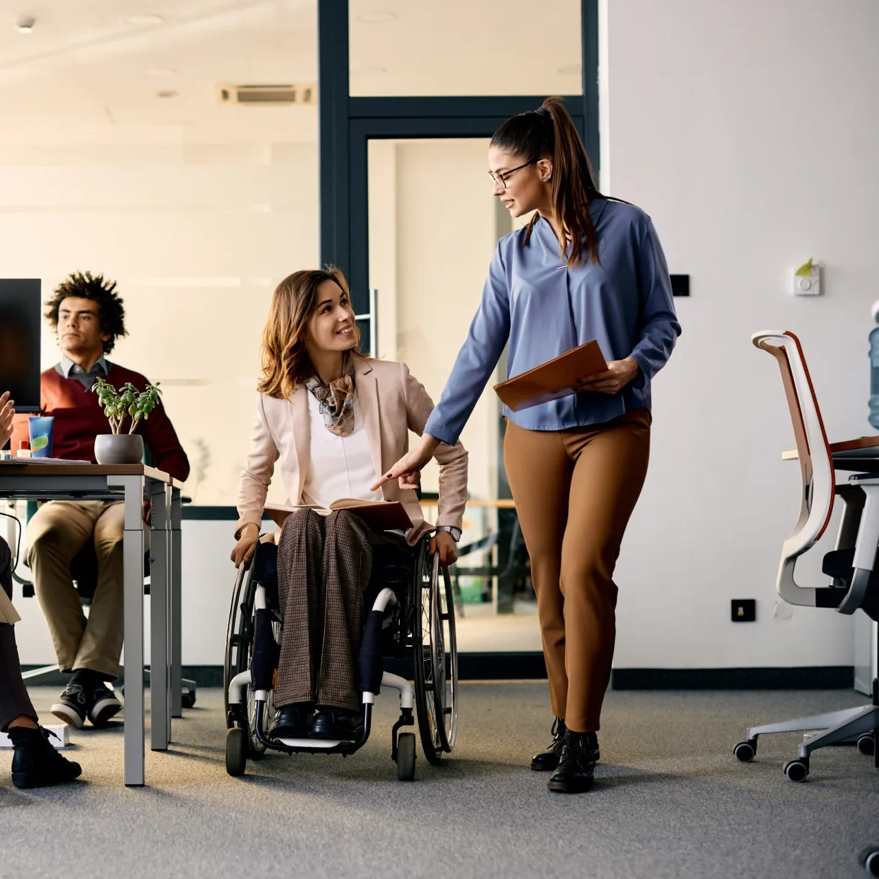 Woman in wheelchair in office - Branchability - Inclusive Workshop and Training